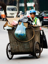 In Hanoi many women work as waste collectors.